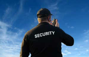 security guard on walkie talkie